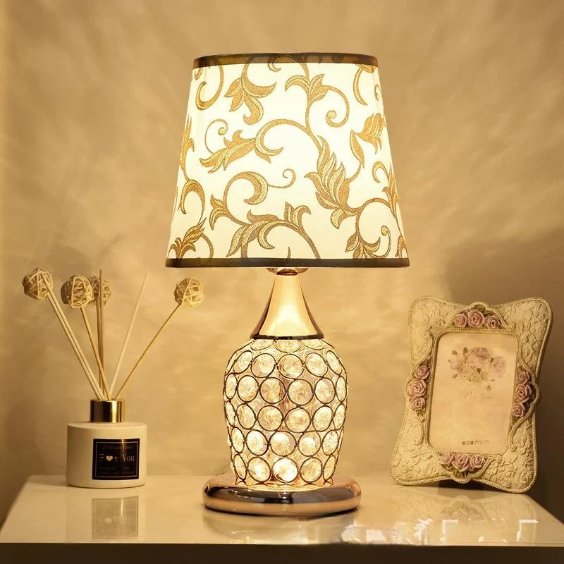 A Minimalist Modern Bedside Lamp Creates Warm Atmosphere In The Bedroom — image 3