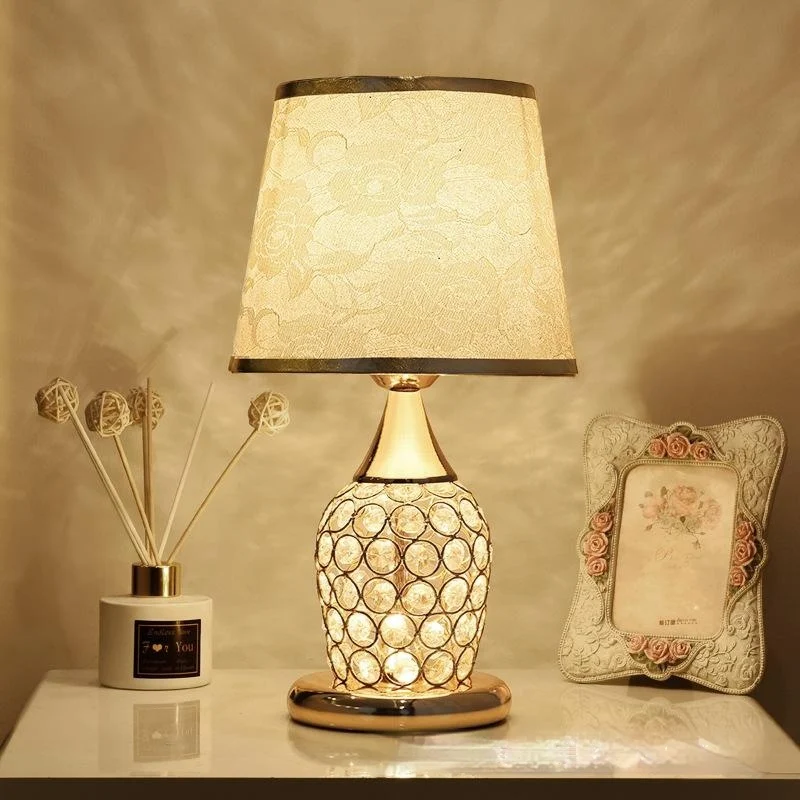 A Minimalist Modern Bedside Lamp Creates Warm Atmosphere In The Bedroom — image 2