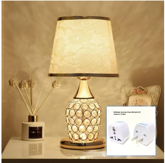 A Minimalist Modern Bedside Lamp Creates Warm Atmosphere In The Bedroom — image 4