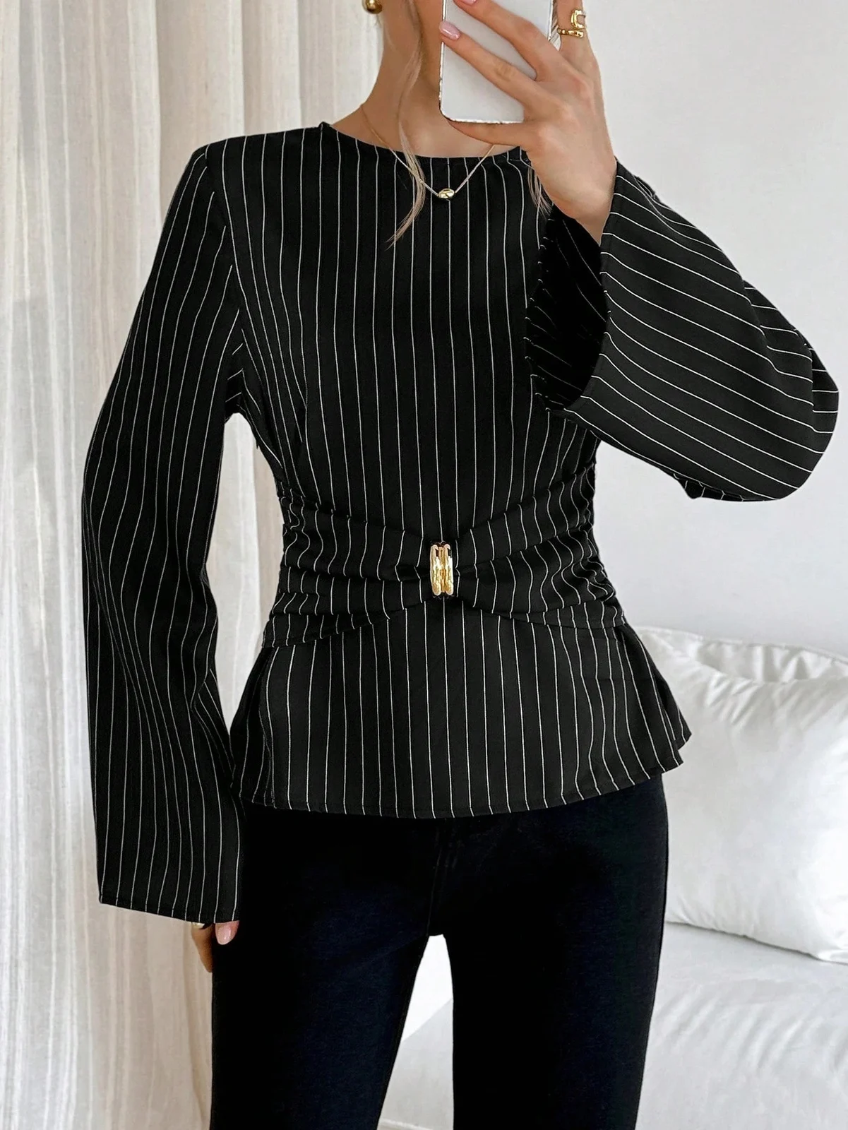 A Stylish Versatile Top With Flared Sleeves And Round-neck Long-sleeve Design — image 1
