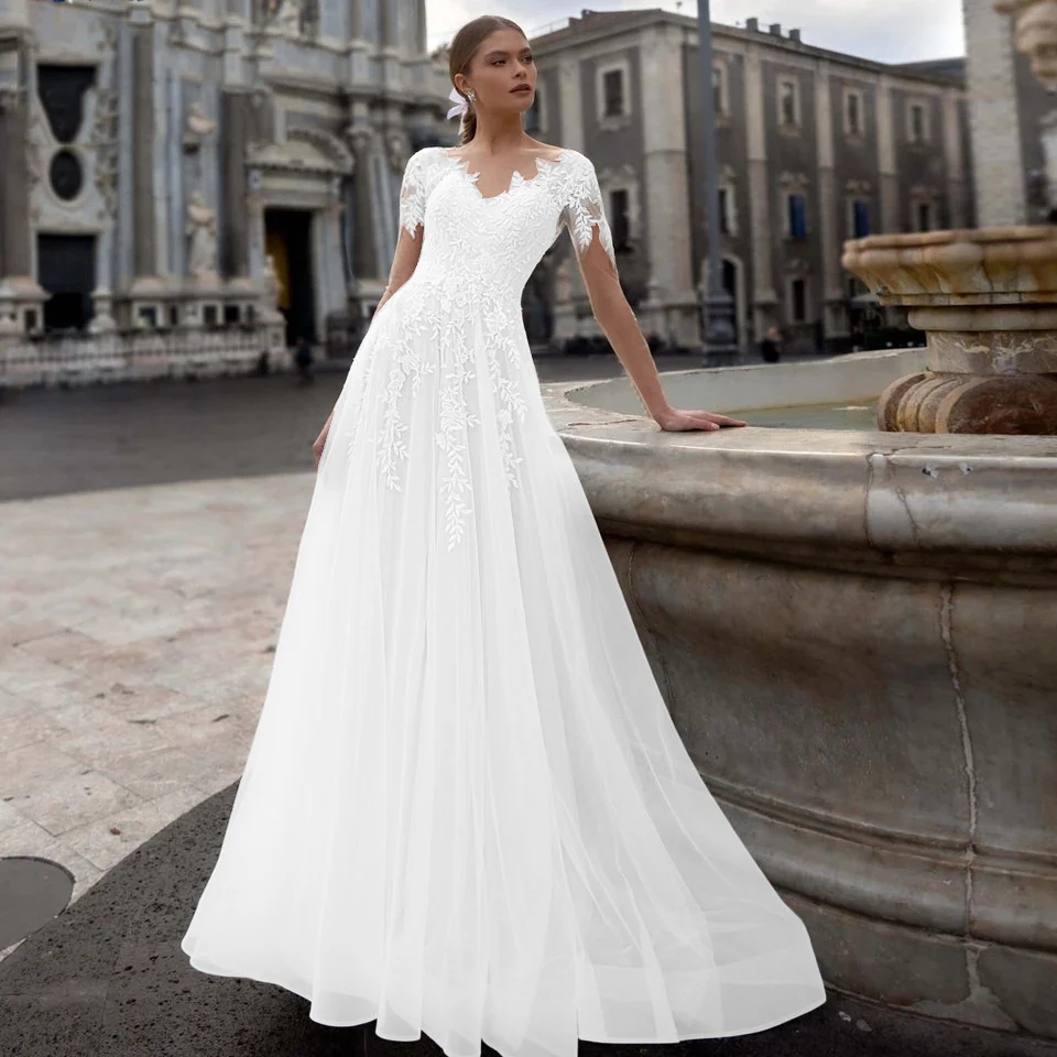 Lace Sheer Tulle A Line Wedding Gown With Short Train, Exuding Elegance For The Bride — image 2