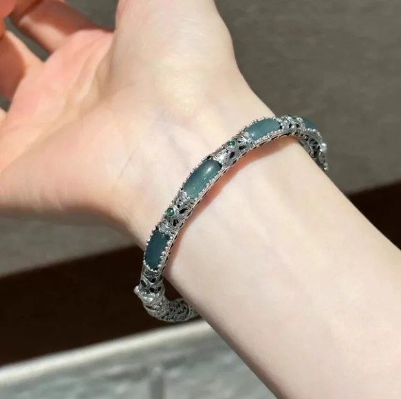 Plain-face Bracelet With An Open Design Featuring Blue-water Jade In A Traditional… — image 4