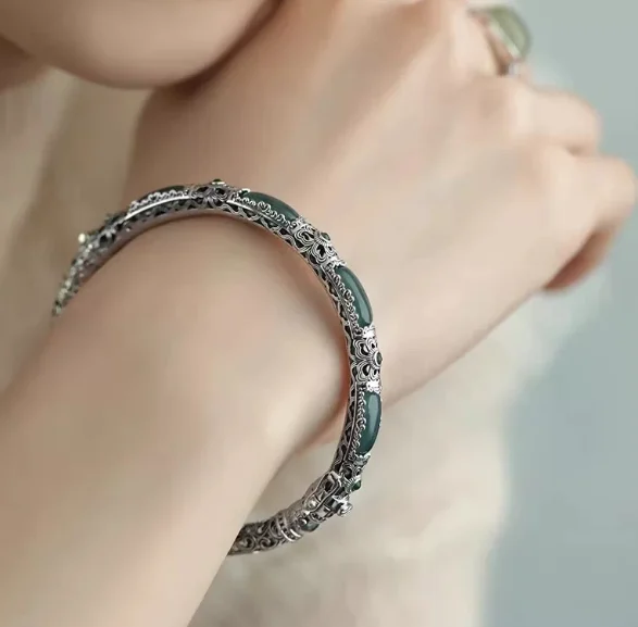 Plain-face Bracelet With An Open Design Featuring Blue-water Jade In A Traditional… — image 2