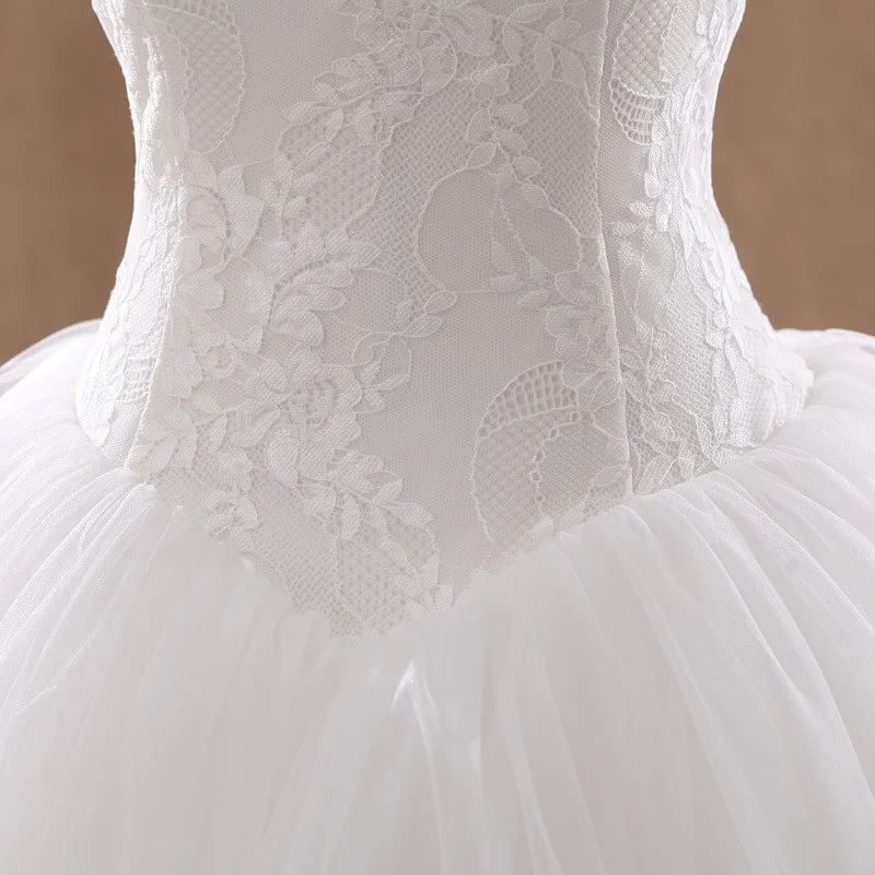 Simple And Elegant Strapless Lace Wedding Dress — image 4