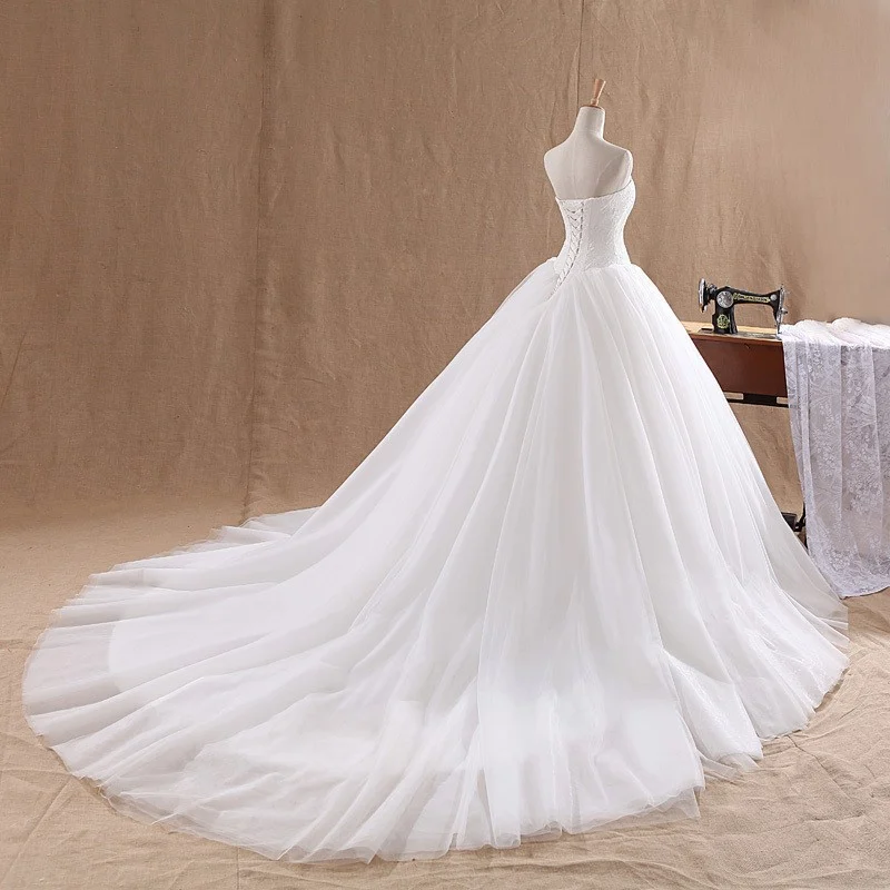 Simple And Elegant Strapless Lace Wedding Dress — image 6