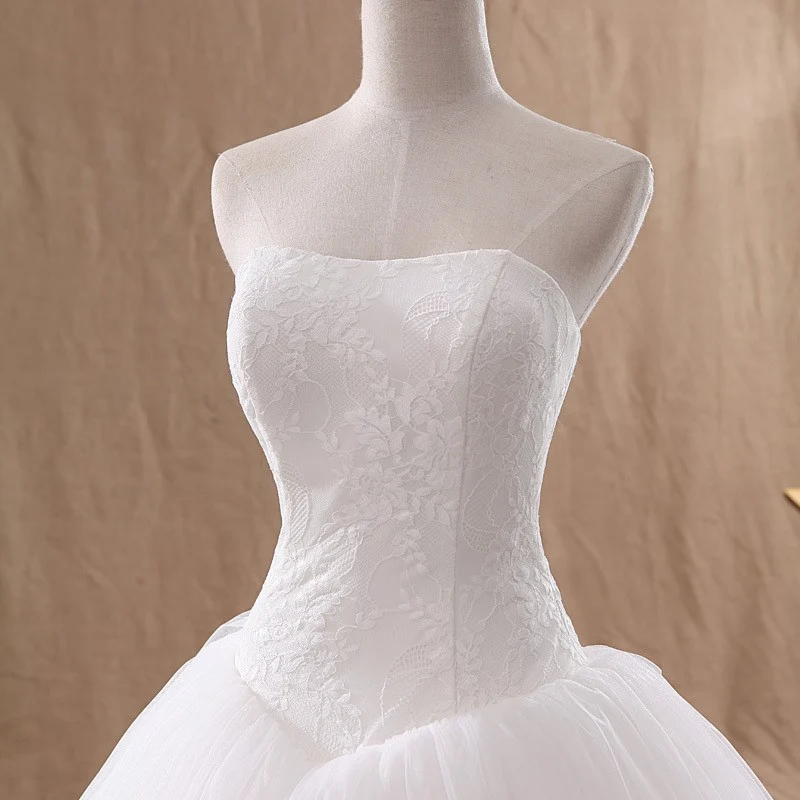 Simple And Elegant Strapless Lace Wedding Dress — image 2